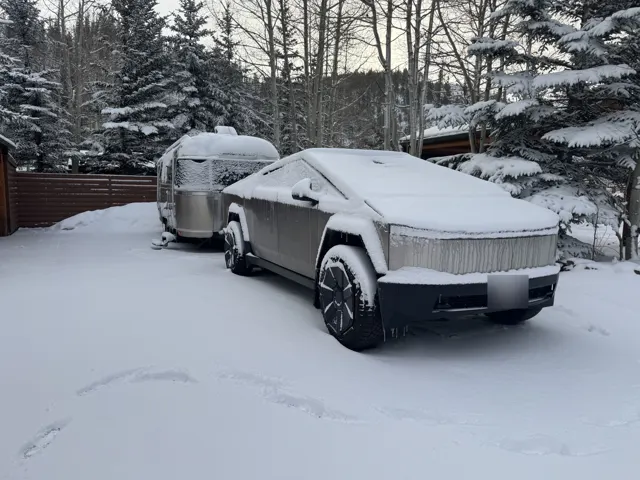 Travel trailer: Snowy morning with the trailer and pickup